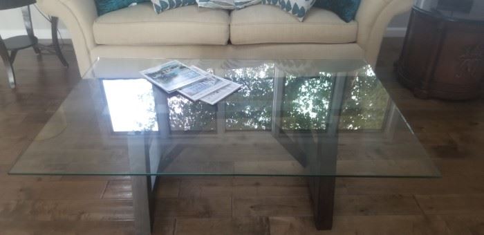 Glass Topped Large Cocktail table wood base.. 56"x36" $150.00