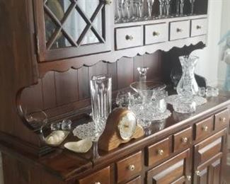 breakfront and tons of glassware, including waterford