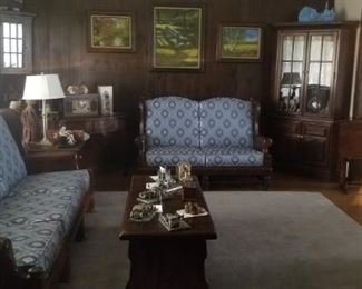 vintage wooden sofa and love cushioned with lots of wood furniture accents