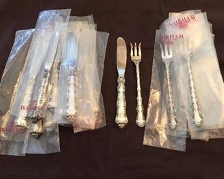 Gorham sterling “Strasbourg “ pattern oyster forks and butter spreaders. 12 of each