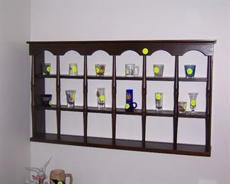 TEACUP AND SAUCER RACK AND COLLECTIBLE SHOT GLASSES