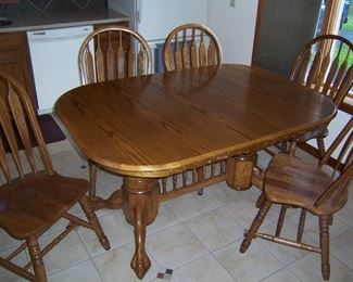 8 FOOT OAK TABLE W/8 CHAIRS
