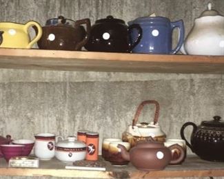 Large collection of teacups, teapots