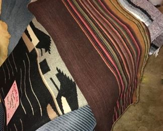 Native American rugs and blankets including a 1940s Navajo rug with thunderbird motif from Chimayo, NM, 7’; 7’ woven blanket; vintage Navajo saddle blanket/rug