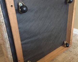 Casters underneath the Upholstered Arm Chair platform (2 of the casters are loose)