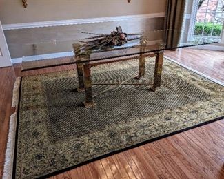 Area rug and dining table brass 