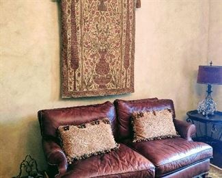 leather couch sofa loveseat and tapestry 
