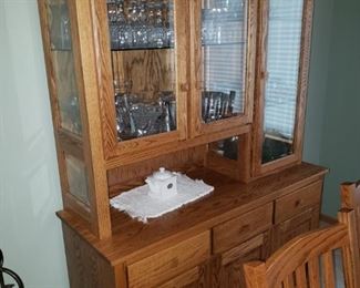 Mission style China cabinet; crystal dishes