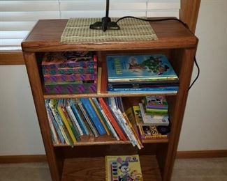 Wood book shelf, desk lamp, books