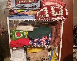 Blankets,  Afghans, wire shelf unit