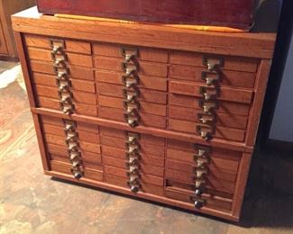 Wonderful Institutional Oak Cabinet with Thin Drawers... all there and works well.  Comes apart with ease for moving and has wheels