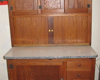 Nice antique oak Hoosier style cabinet with enamel worktop. 
