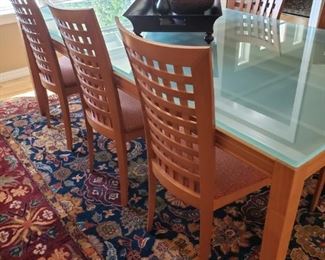 Slater and Marinoff Modern Table with Sea Glass Top and 8 Designer Chairs. Large Wool Designer Carpet.