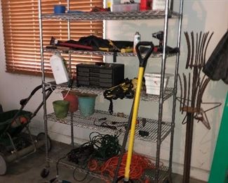 Garage items misc.; metal shelving rack on wheels