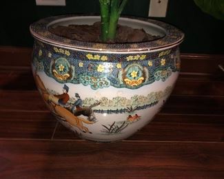 Asian style planter with jumping horses