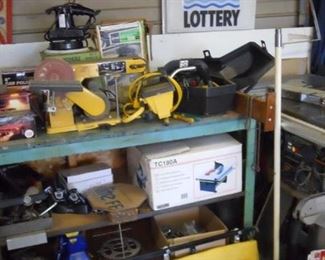 chain saw, table saw? buffer,++ metal bench also for sale, jack stands