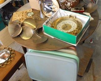 brass propellors, tray tables,sun/moon decor, wood table w/ 2 leafs