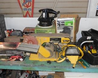 tools, bench grinder, buffer, chain saw, work light