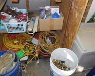 extension cord, bucket of gloves, electri, swiches recepticles, boxes and wire, door knobs
