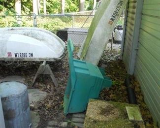 two dighy's, patio blocks, plastic yard barrow, metal trash cans