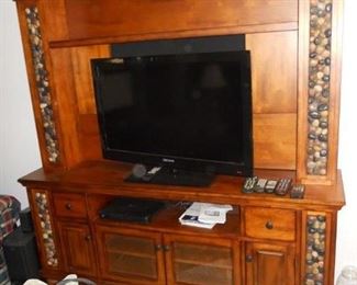 entertainment center w.  imlaid stone, flat screen tv sony surround sound