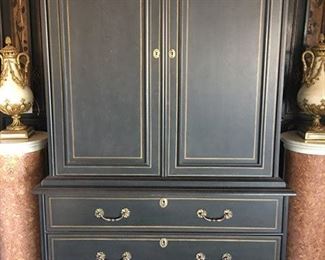 Bl"A GEORGIAN STYLE EBONIZED “LINEN PRESS”
The superstructure fitted with hinged and fitted double doors
below an ogee-molded flat pediment; the supporting
casement fitted with three drawers and mounted with foliatecast
bronze pulls.
Condition: Very good."   **Companions with Chinoisserie Bed previously pictured 