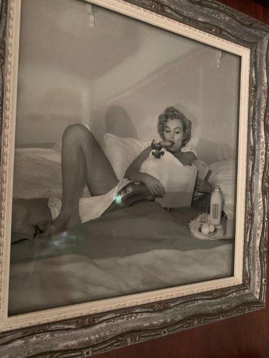 BLACK AND WHITE PHOTOGRAPH, BY ANDRE DE DIENESS OF MARILYN MONROE, "Breakfast in Bed", 1953. Gelatin Silver Print . Vintage.SW32232 cm, full length, right knee up, with carrot in mouth looking at paper