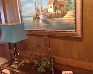 Another sofa table and framed art