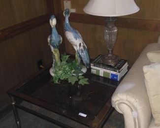 One of two brass & glass end tables