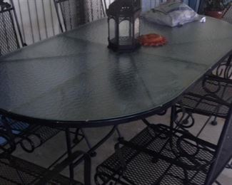 Oval patio table; spring chairs
