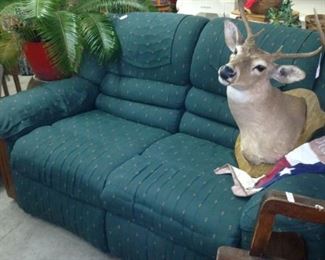 Double recliner; deer mount