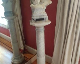 Antique marble bust of two children, atop a white marble pedestal, signed Capricci.