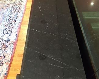 Black marble top of the Marge Carson buffet.