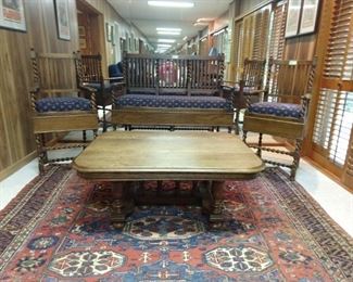 AMAZING vintage English oak barley twist pool chairs and settee, vintage English oak coffee table, all atop a vintage Turkish flatweave wool rug.