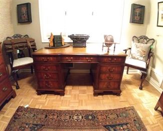Fabby vintage English partner's desk, pair of Victorian mahogany armchairs, vintage Underwood typewriter and Persian Mahal rug.