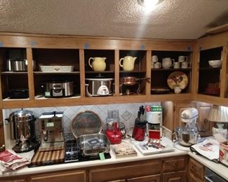 Kitchen full of baking goodies, KitchenAid mixer, with cover, Cuisinart, Mr. Coffee, Italian Rancilio "Miss Sylvia" espresso maker, Crock Pots, panini press, large coffee maker for you own little Army, etc.