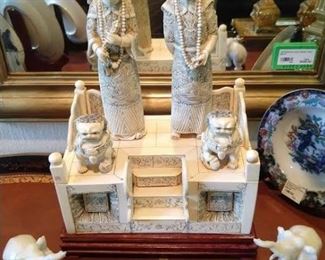 Vintage Asian bone ancestral piece, with pair of gift-boxed carved jade elephants on wooden stands.