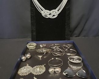 Splashes of Silver Colored Costume Jewelry