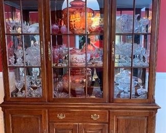 Beautiful china cabinet with mirrored back silver drawer.
