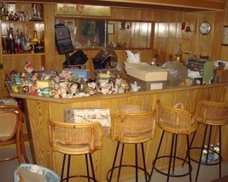 Basement 1950's bar and chairs. many collectibles