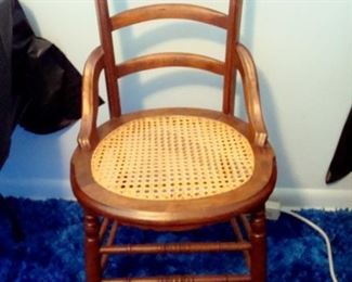 Victorian walnut cane seat chair.