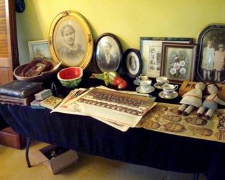 Collectible items including antique photos, two oil paintings, old bean dolls, Majolica parrot, 1887 History, England, Scotland and Ireland, 1987 Browns Memorabilia & etc.