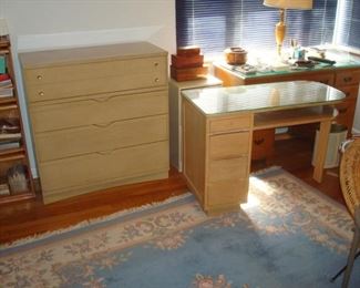 Matching Basset mid century chest and desk and student desk at the rear.