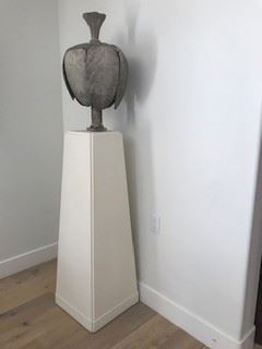 "Feather" Baldican, Italian 18th Century, hand carved, original paint. $2000.Pedestal, circa 1960, Designed and produced by Albert Hadley $500