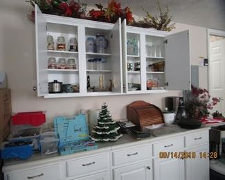 Garage blt in cabinet full of great finds.. holiday items, etc. appliances, etc..