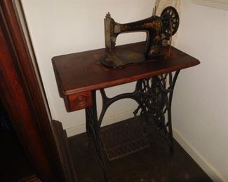 Antique peddle sewing machine