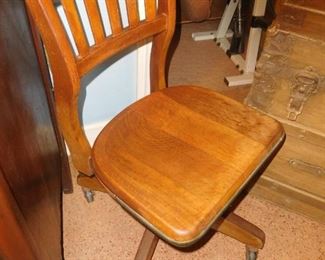 Petite oak swivel chair