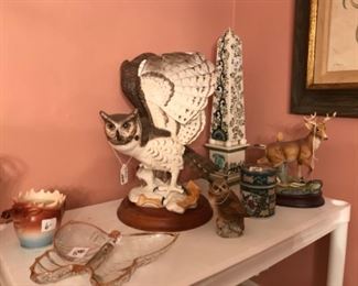 Owl and deer statues