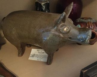 REGGIE MEADERS, AMERICAN 1916-2009, HAND MADE CLAY BOAR WITH LARGE TUSKS, HEIGHT 7 1/2” , LENGTH 13”, WIDTH 6”, SIGNED