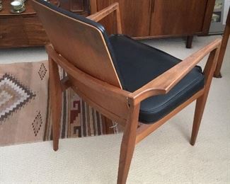 backside of teak desk chair – $165